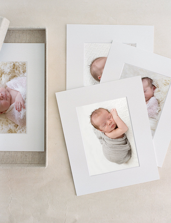 Portfolio box of newborn baby photos