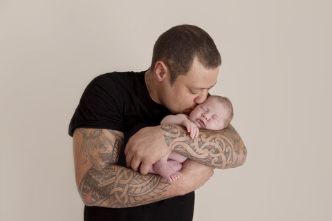 Dads and newborns photographed in Bubs + Us photoshoots